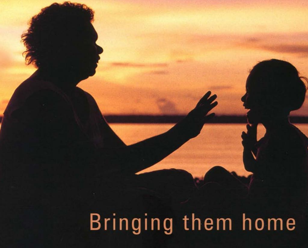 Bring them home report - Mother reaching out to touch child at sunset